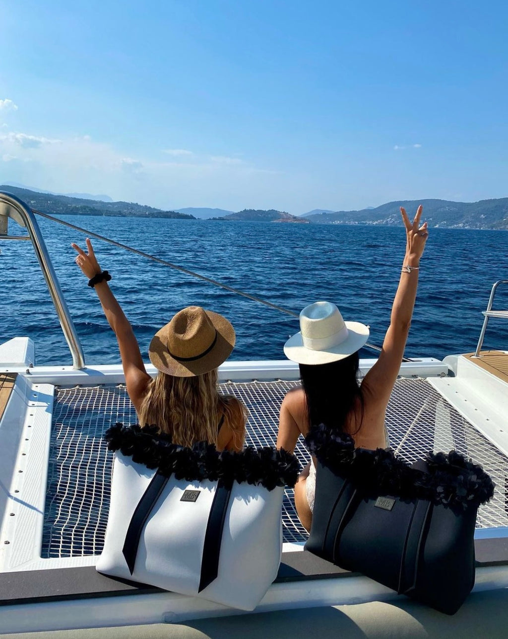 Two people on a boat with scenic ocean view
