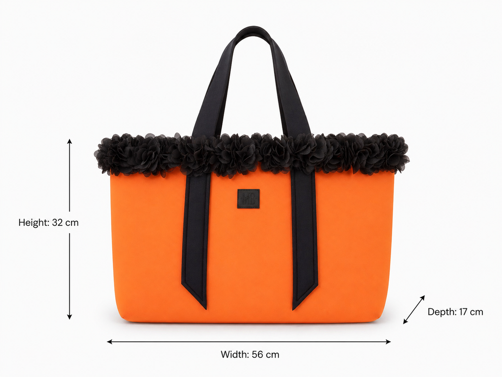 Orange tote bag with black floral details and measurements on a white background